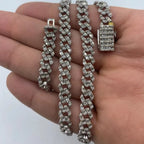 10K Gold 6.5mm Cuban Link Diamond Baguette Chain 18–24 in in white gold, 20" - close-up product photo