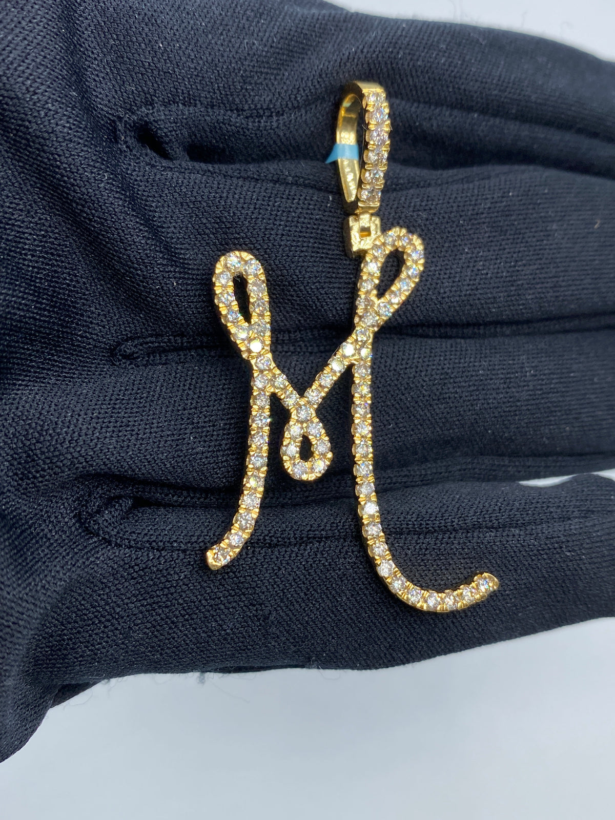 14K Gold Initial M Large Script Diamond Pendant in yellow gold - close-up product photo