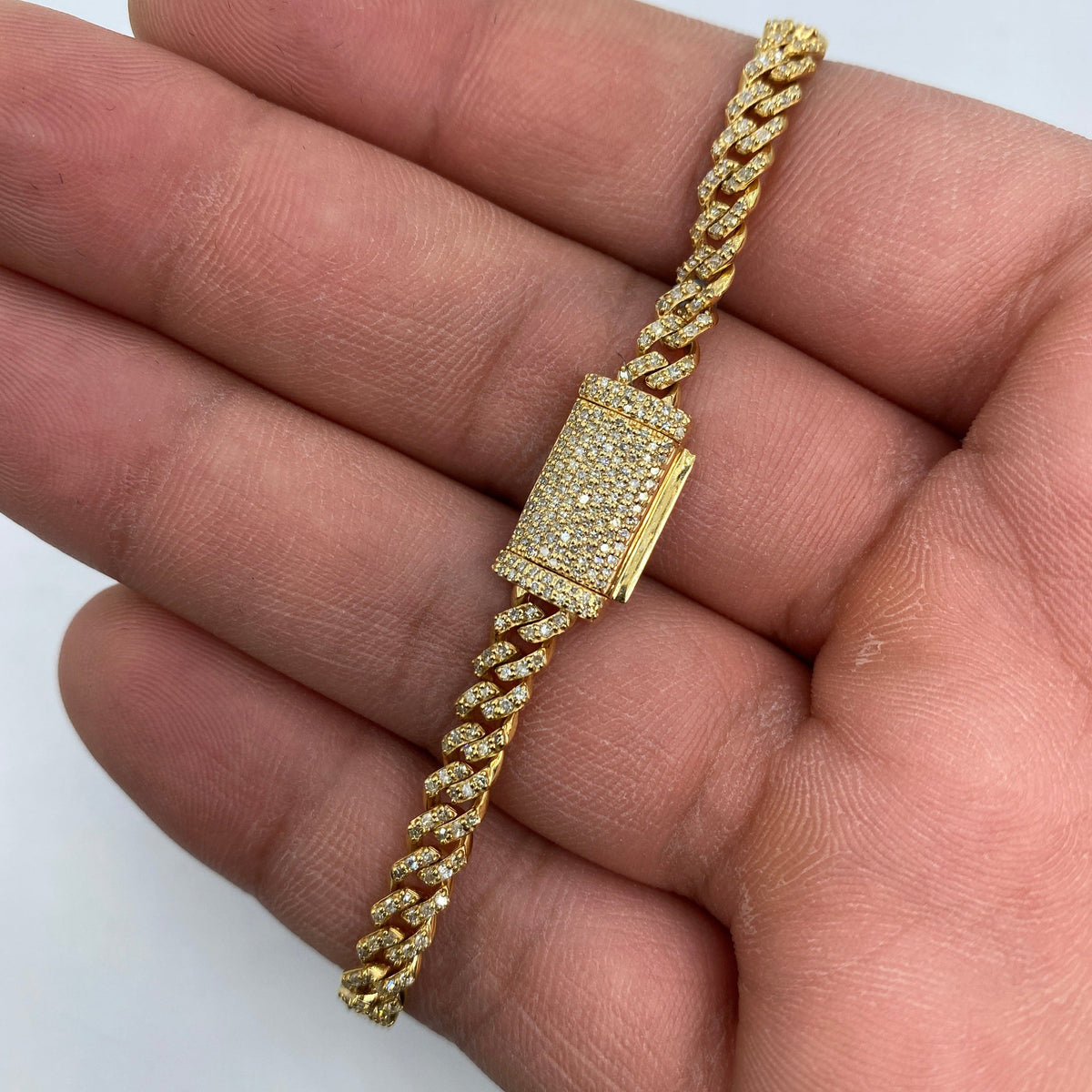 14K Gold 5mm Cuban Link Diamond Bracelet 7–8 in in yellow gold, 7" - close-up product photo