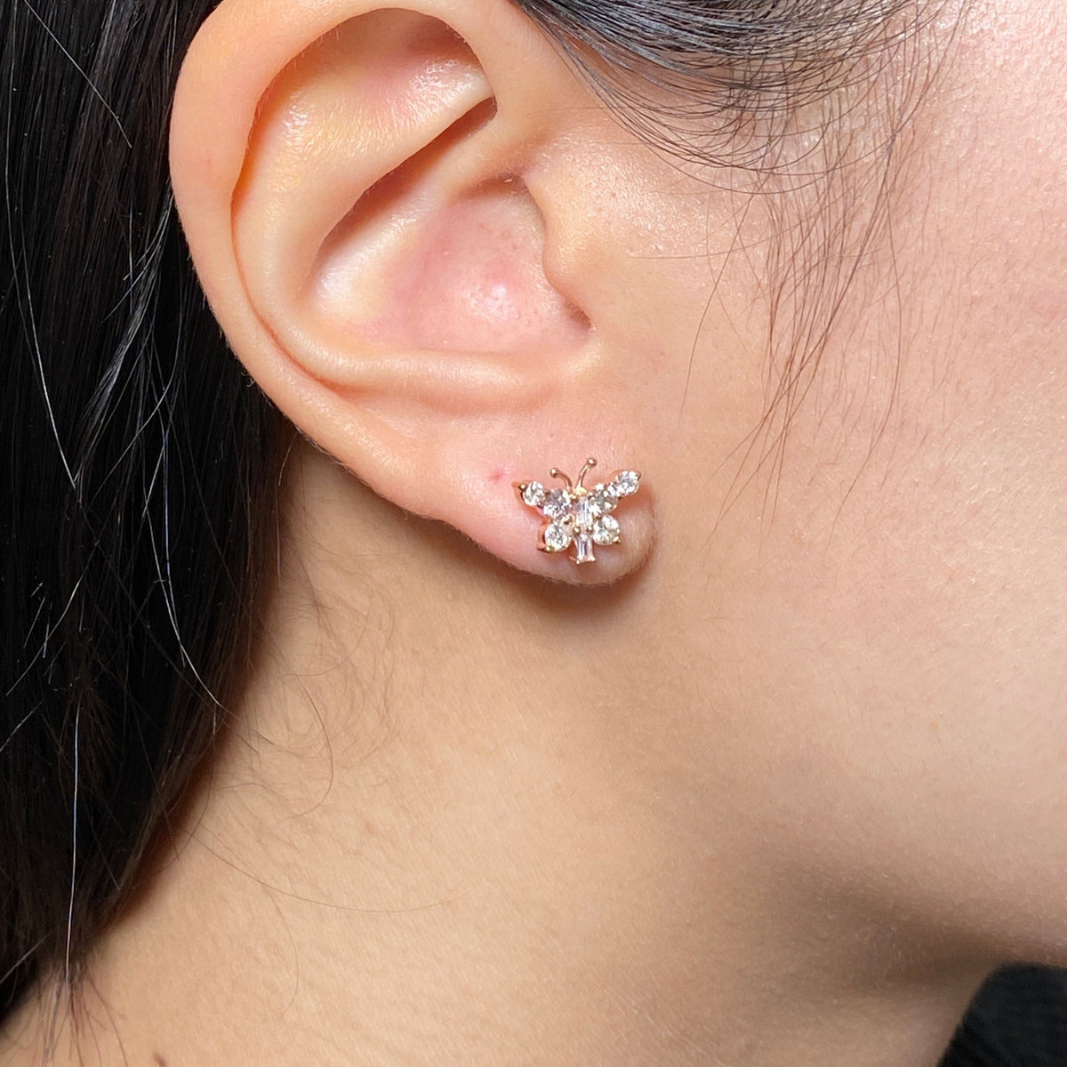 14K Gold Butterfly Diamond Baguette Earrings in rose gold - close-up product photo