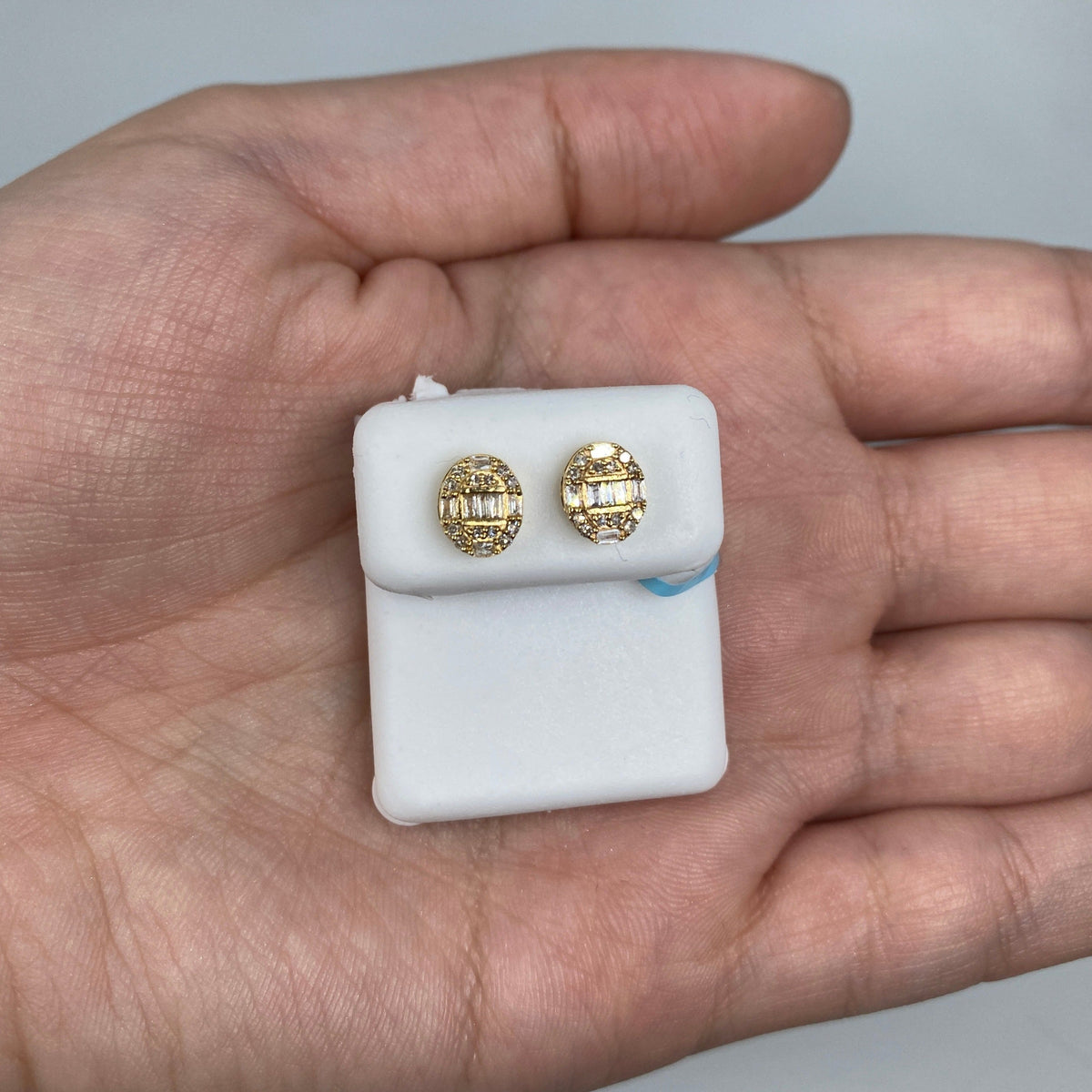 14K Gold Oval Dragon Egg Stud Diamond Baguette Earring in yellow gold - close-up product photo