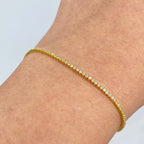 14K Gold 1.5mm Diamond Tennis Bracelet 6.5–7 in in yellow gold, 6.5" - close-up product photo