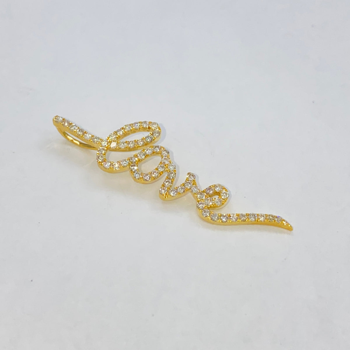 10K Gold Love Script Diamond Pendant in yellow gold - close-up product photo