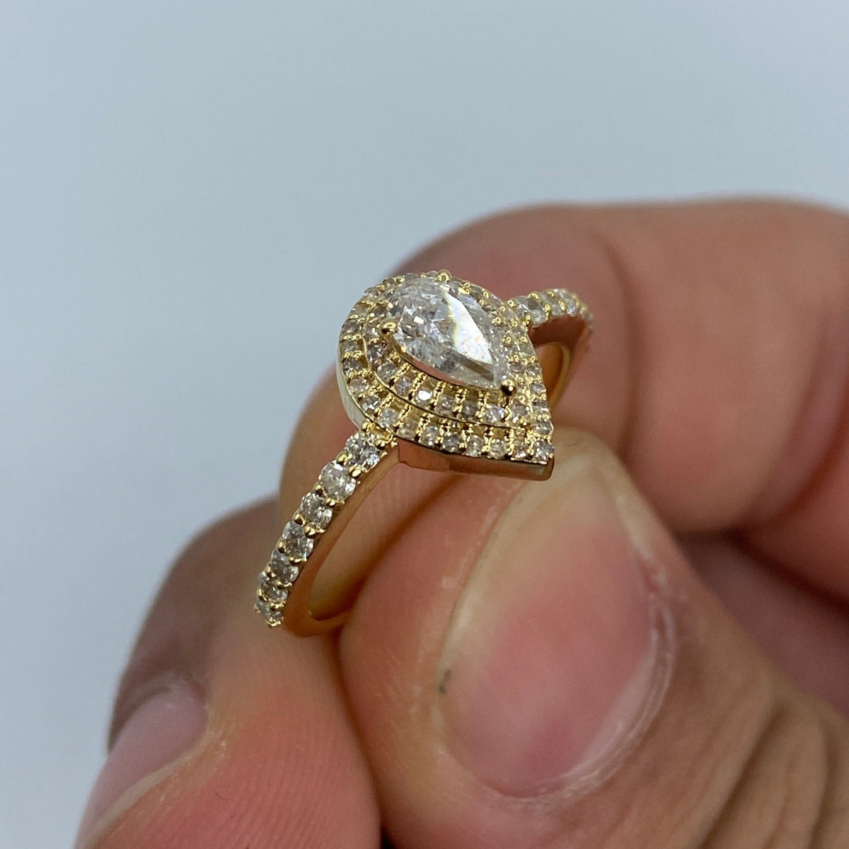 14K Gold Pear Shape Large Center Stone Diamond Engagement Ring in yellow gold - close-up product photo