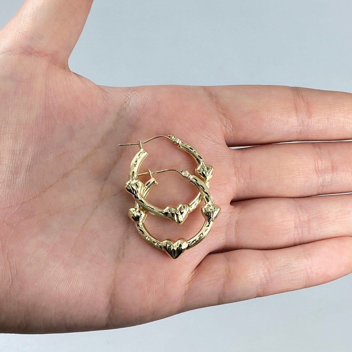 10K Gold Jolyne Heart Hoop Earrings, 1.2" - close-up product photo