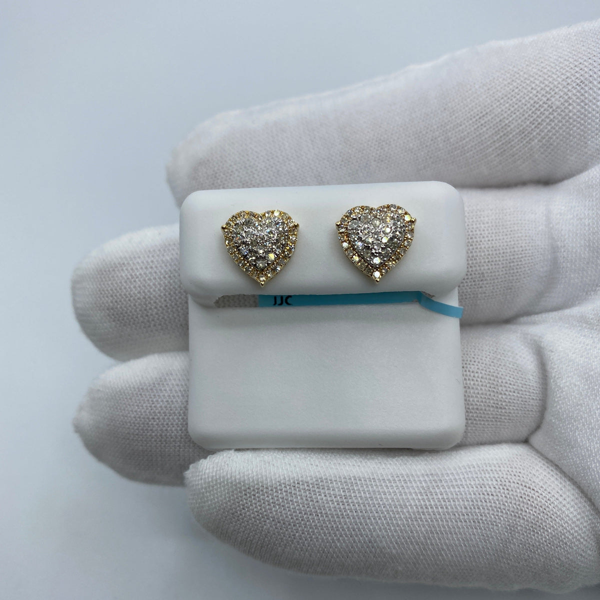 14K Gold Heart Halo Diamond Earrings in yellow gold - close-up product photo