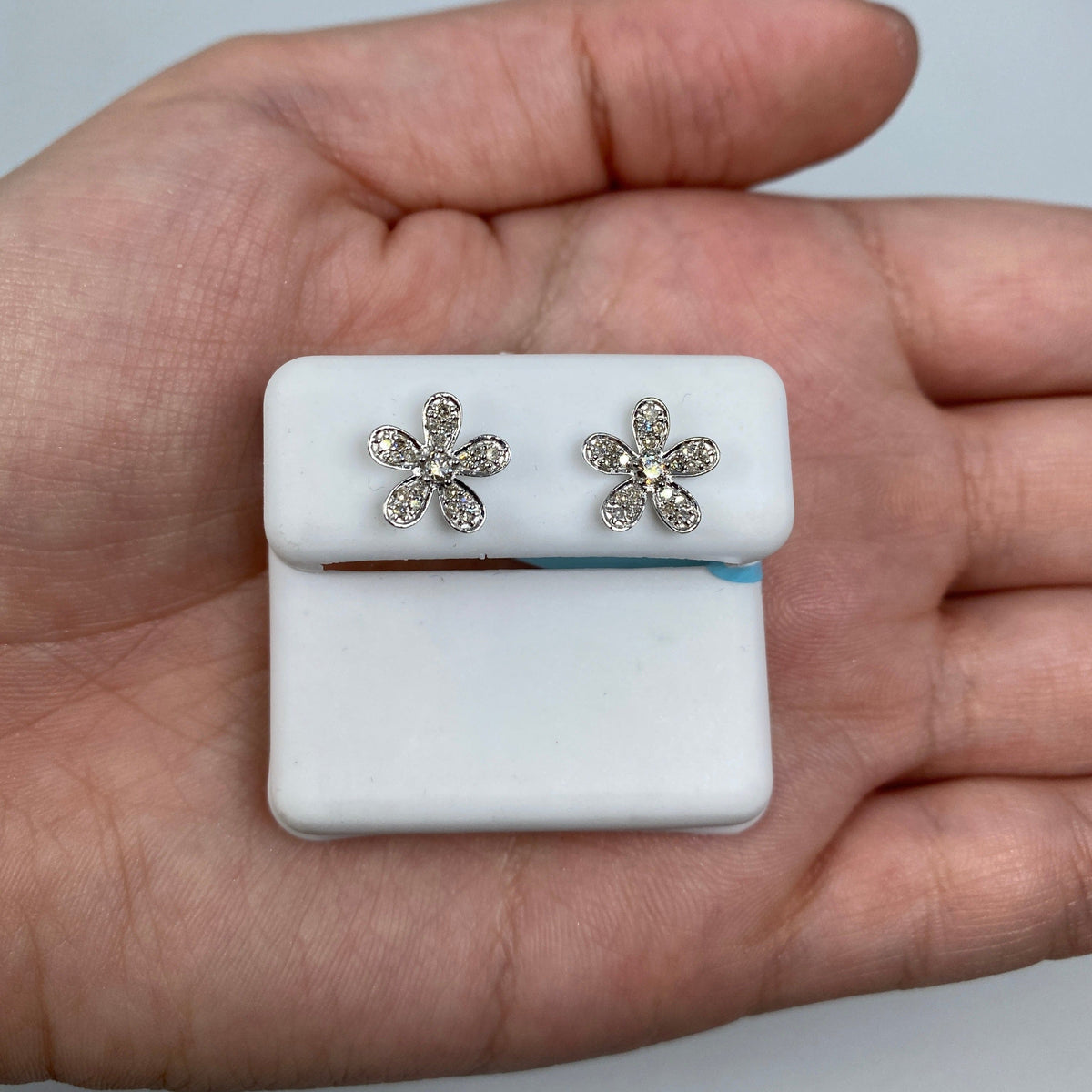14K Gold Daisy Flower Diamond Earrings in white gold - close-up product photo