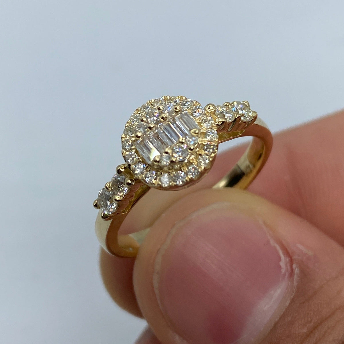 14K Gold Circle Diamond Baguette Engagement Ring in yellow gold - close-up product photo
