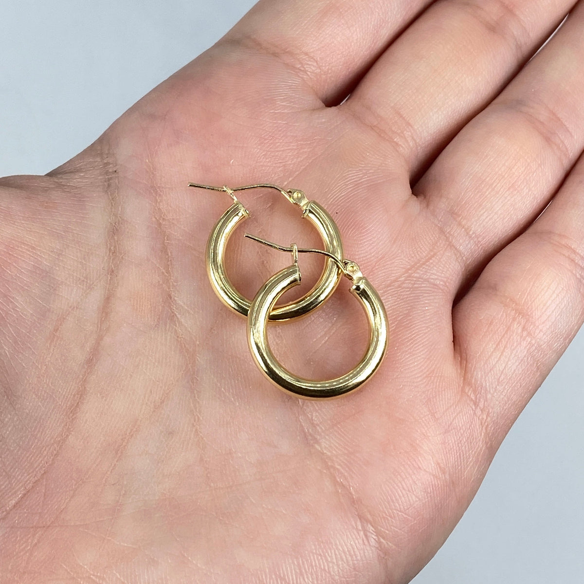 10K 3.2mm Yellow Gold Hoop Earrings, 20mm - close-up product photo