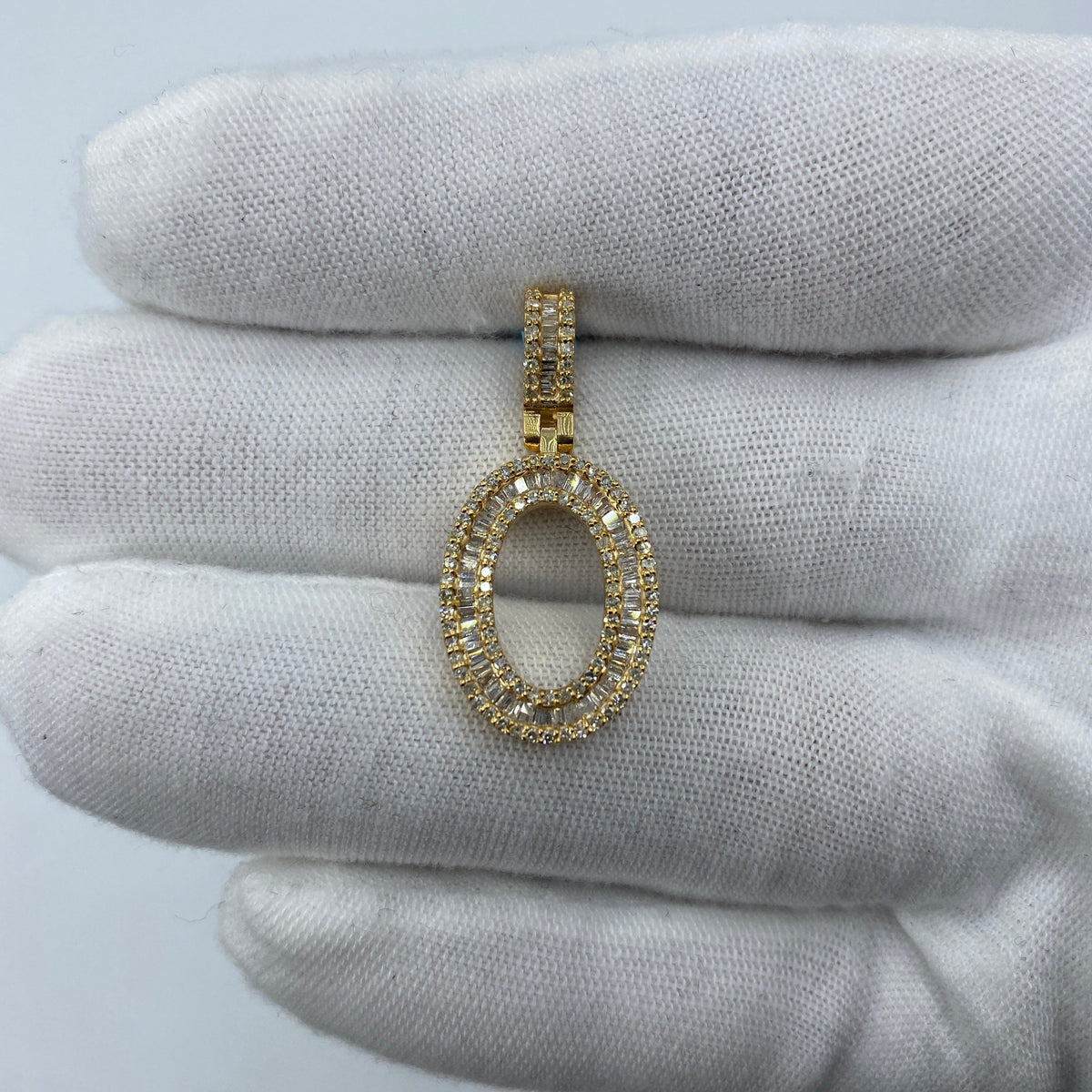 14K Gold Initial O Diamond Baguette Pendant in yellow gold, Small - close-up product photo