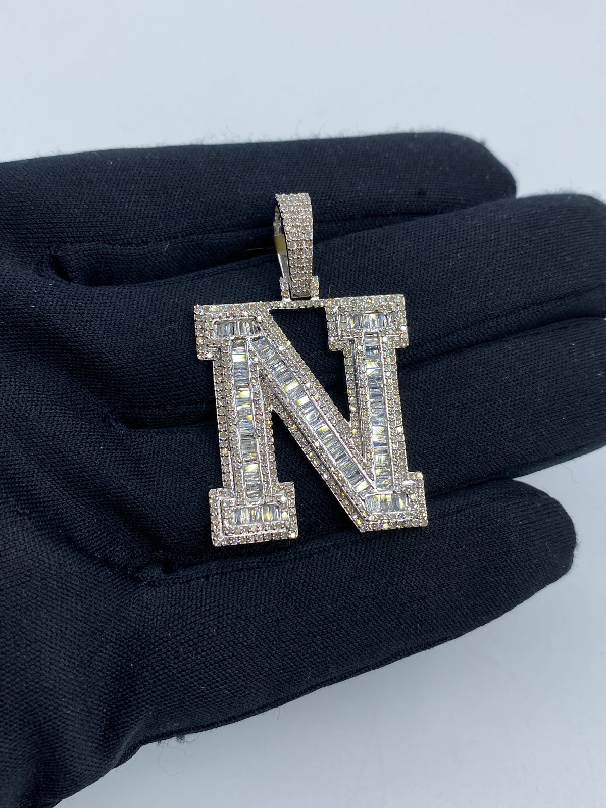 Initial N Baguette Diamond Pendant in white - close-up product photo