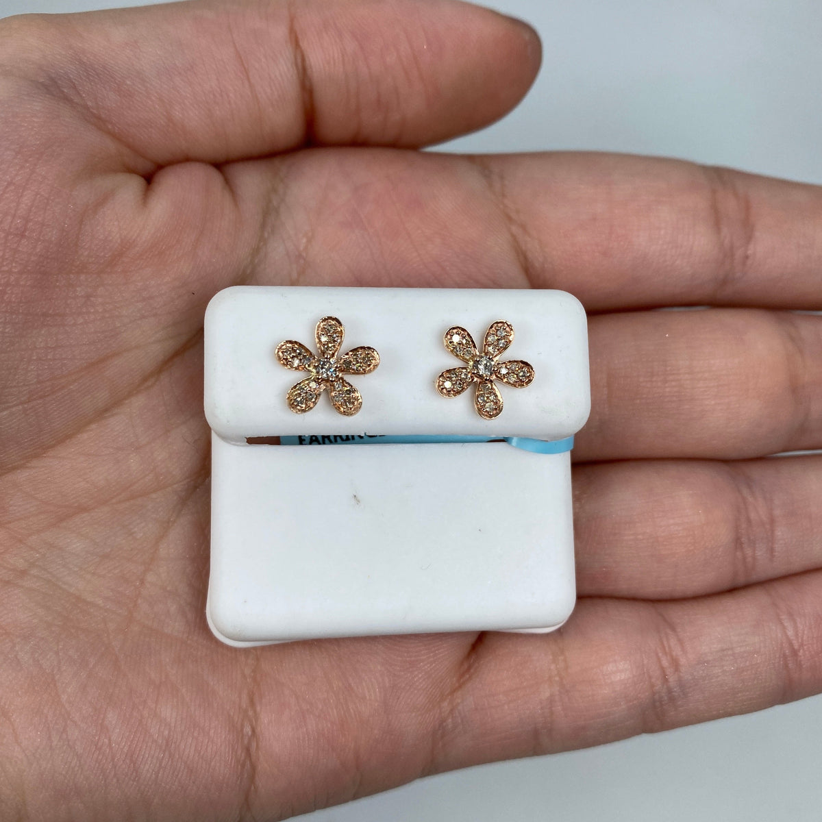 14K Gold Daisy Flower Diamond Earrings in rose gold - close-up product photo