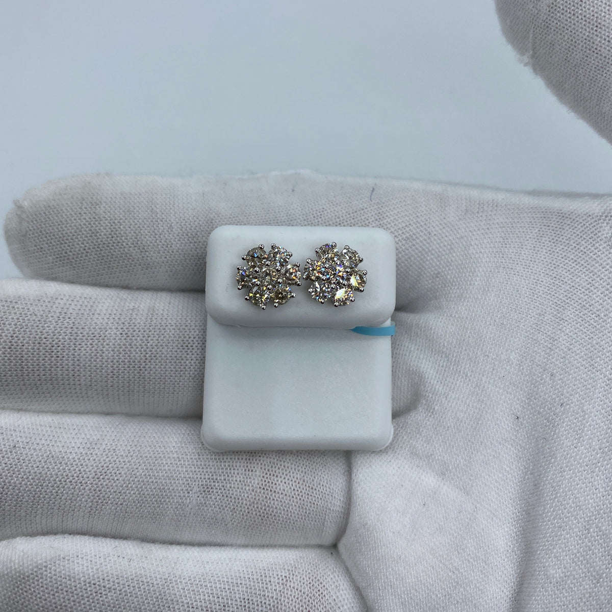 14K Gold Snowflake Diamond Earrings in white gold, Small - close-up product photo