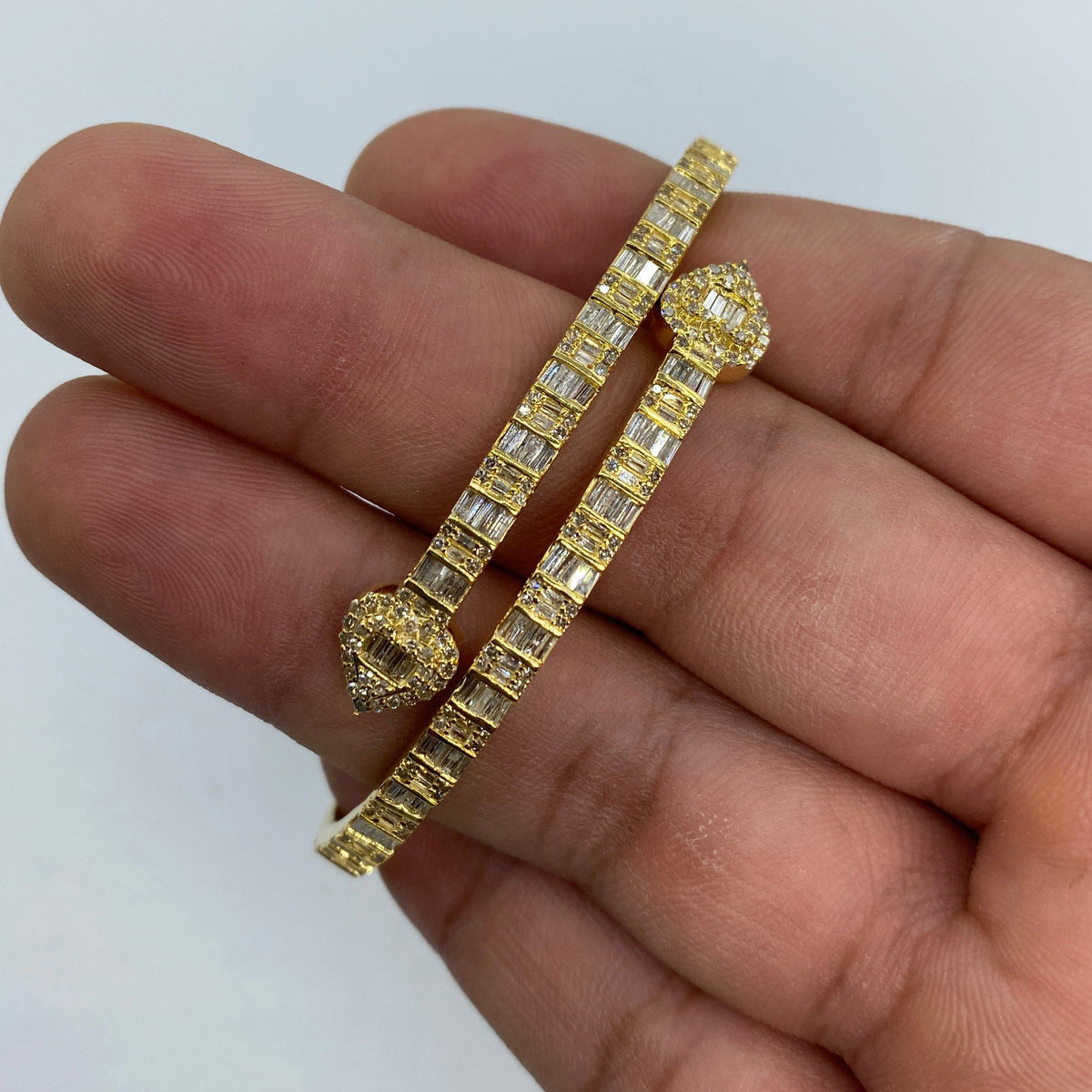 10K Gold Bangle Heart Diamond Baguette Bracelet in yellow gold - close-up product photo