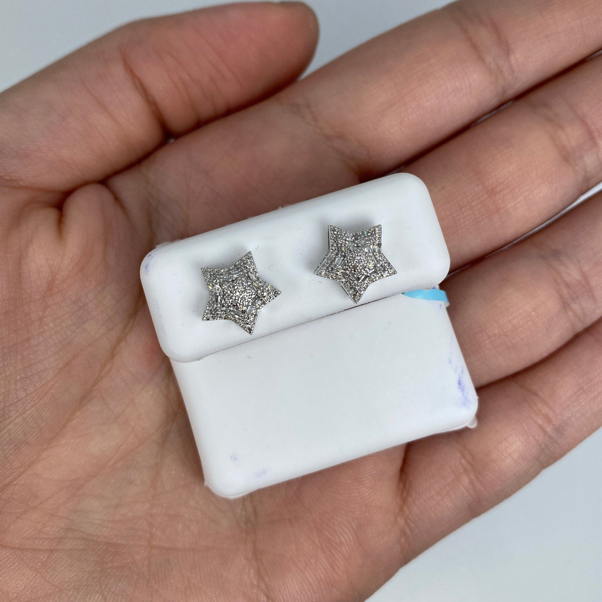 14K Gold 3D Star Diamond Earrings in white gold - close-up product photo