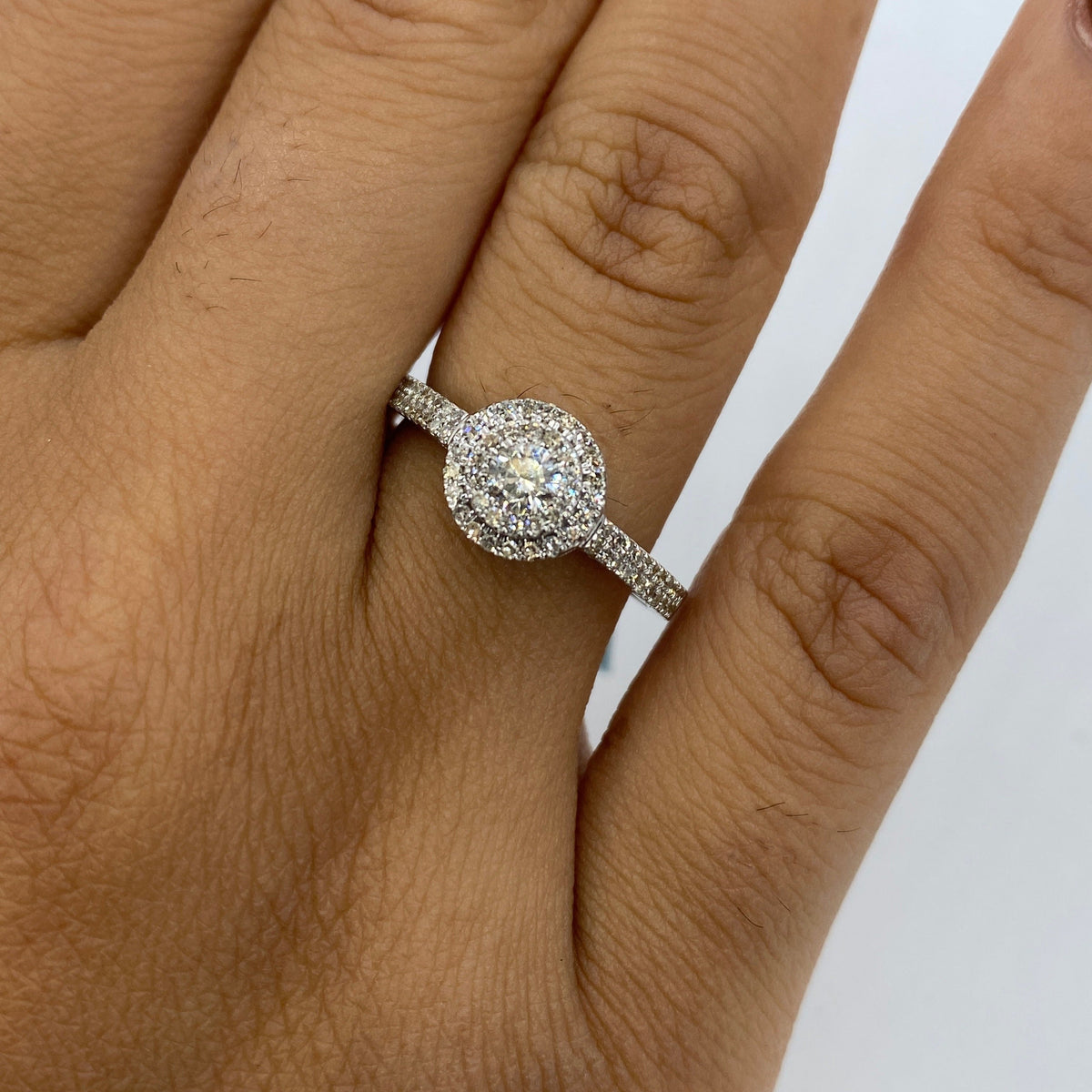 14K Gold Circle Halo Diamond Engagement Ring in white gold - close-up product photo