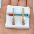 14K Gold Rococo Diamond Baguette Dangling Earrings in yellow gold - close-up product photo