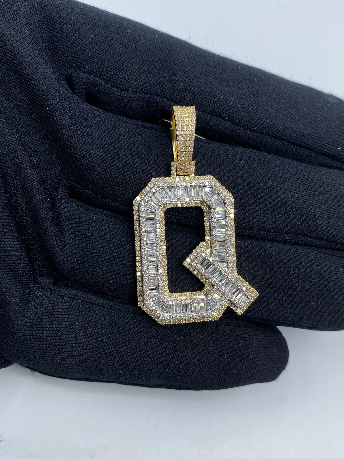 Initial Q Baguette Diamond Pendant in yellow - close-up product photo