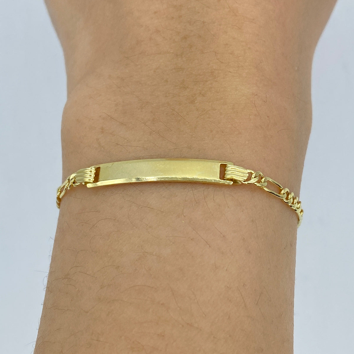 10K Gold Custom Name Plate Figaro Link Baby Diamond Bracelet, 4.4mm - close-up product photo