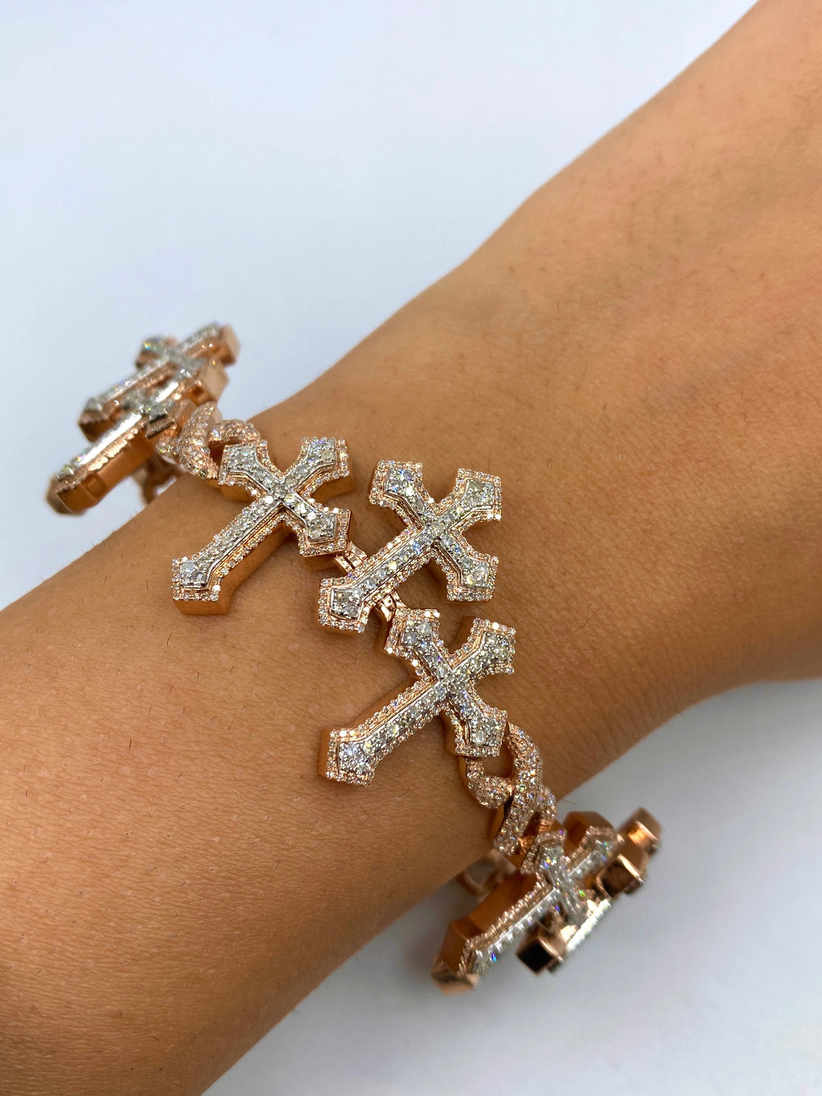 10K Gold Triple Infinity Cross Diamond Bracelet in rose gold - close-up product photo