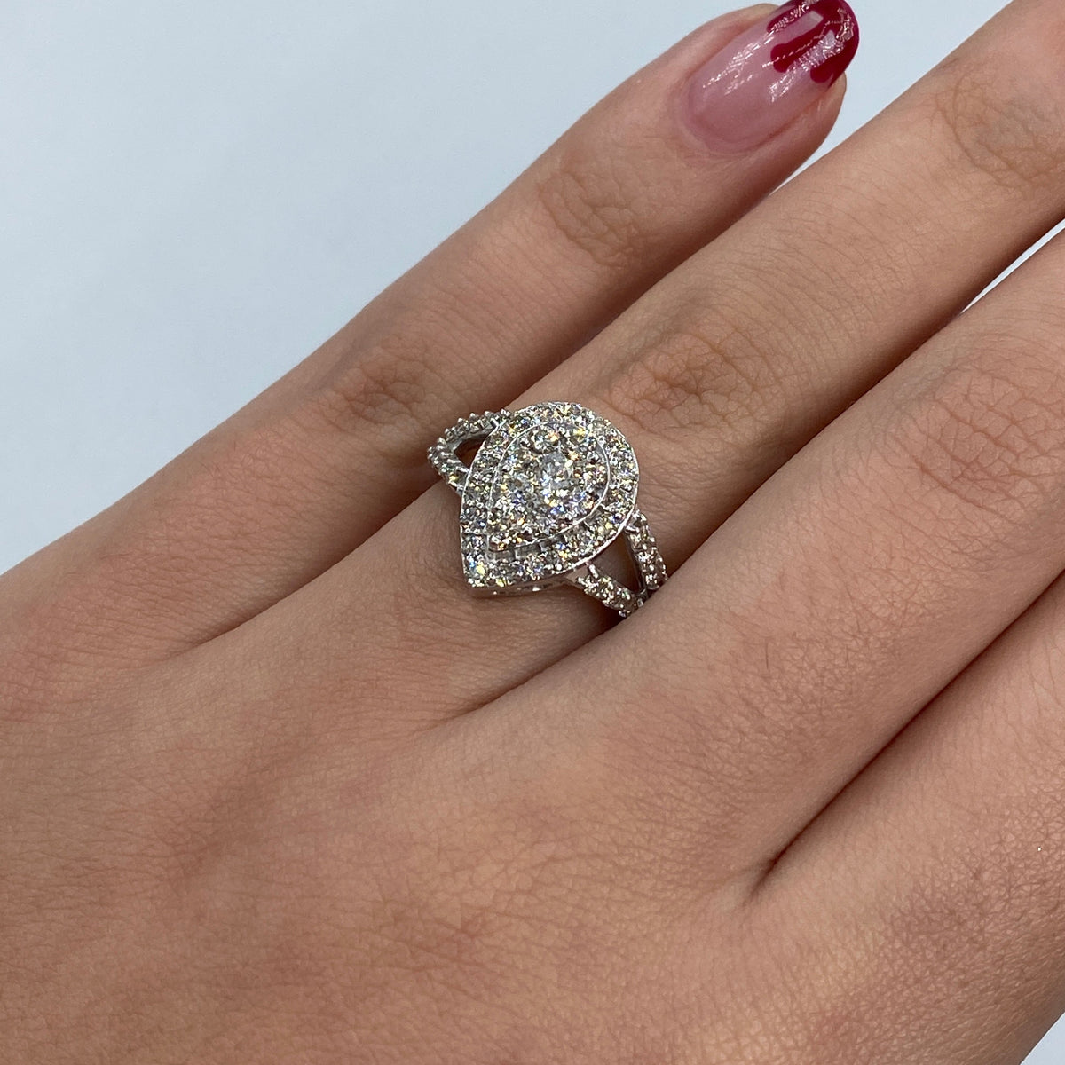 14K Gold Cherish Halo Pear Diamond Engagement Ring in white gold - close-up product photo