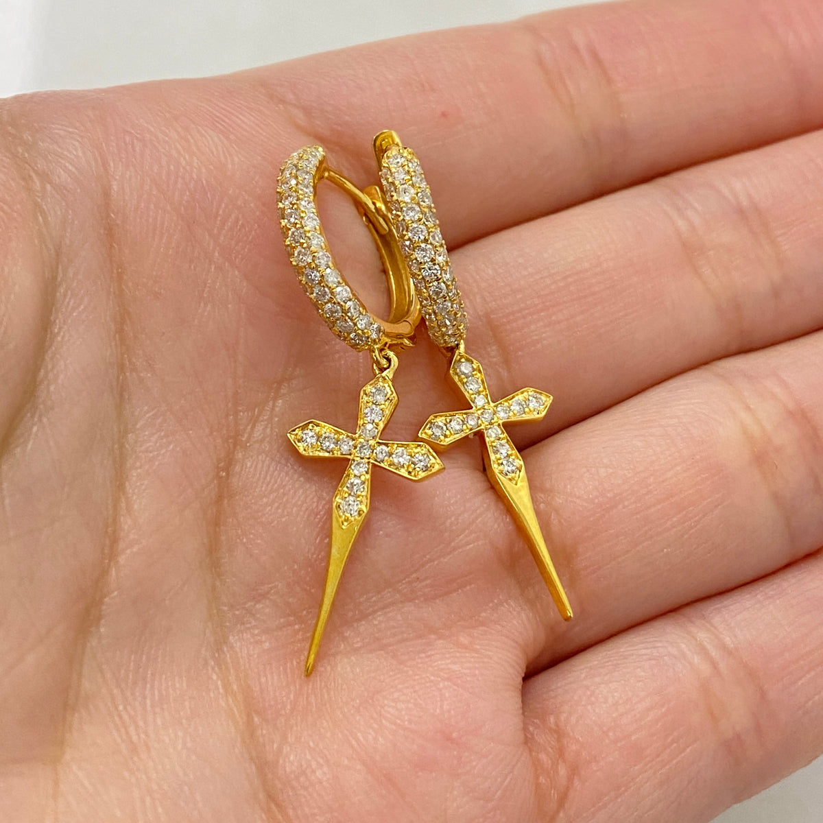 14K Gold Pave Cross Diamond Hoop Earrings in yellow gold - close-up product photo
