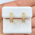14K Gold Bold Diamond Baguette Hoop Earrings in yellow gold, Medium - close-up product photo