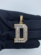 Initial D Baguette Diamond Pendant in yellow - close-up product photo