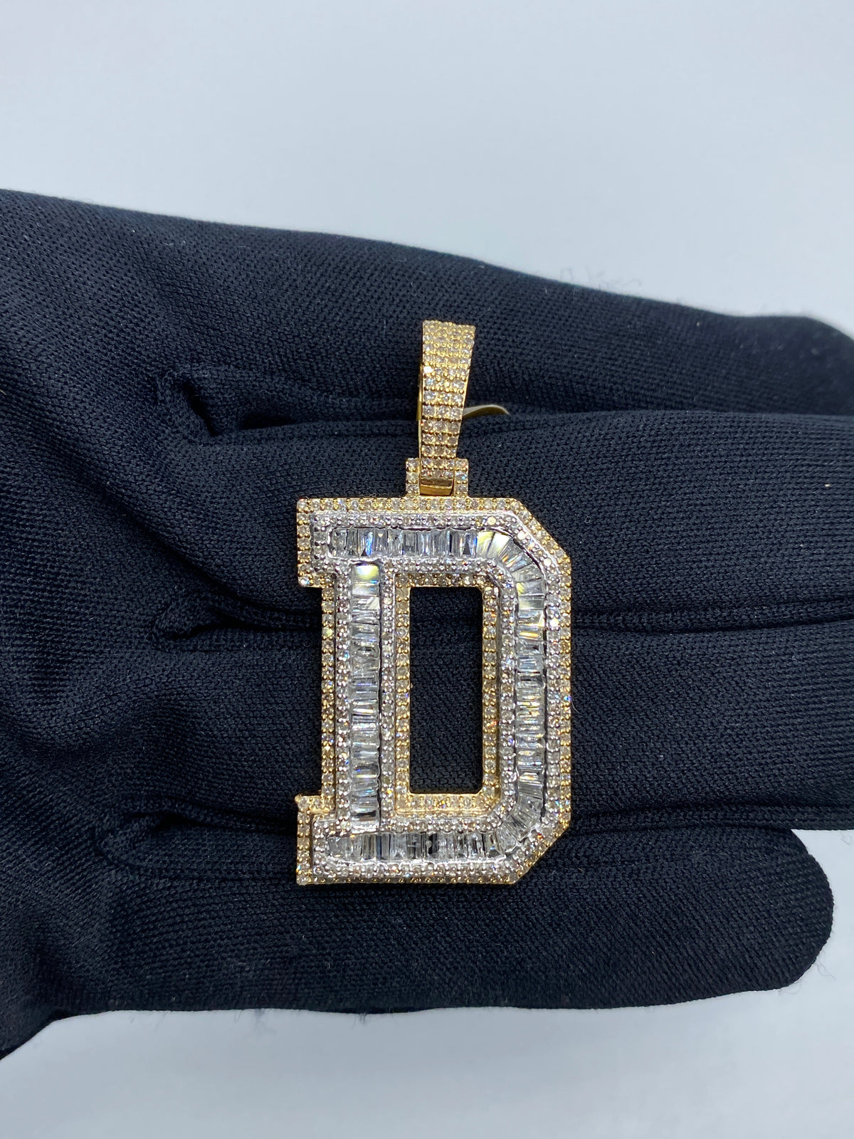 Initial D Baguette Diamond Pendant in yellow - close-up product photo