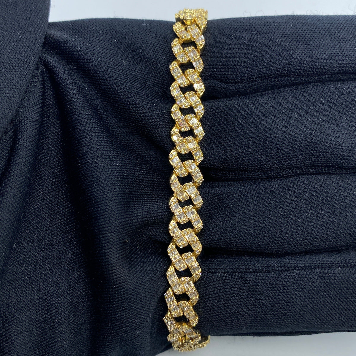 10K Gold 6.5mm Cuban Link Diamond Baguette Bracelet 7–8 in in yellow gold, 7" - close-up product photo
