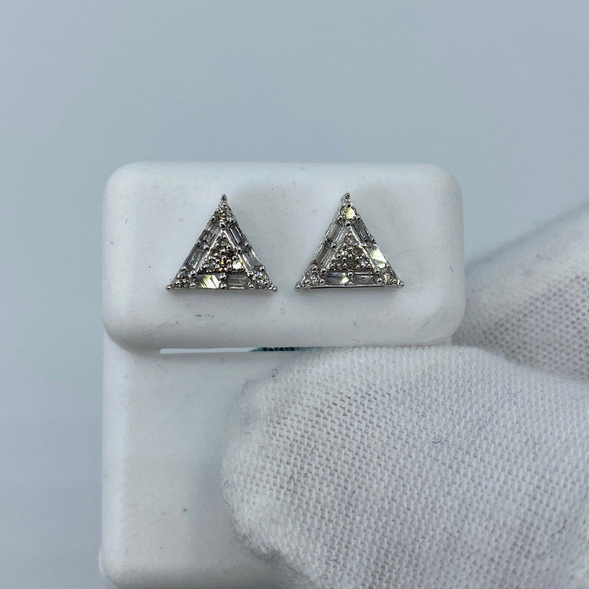 14K Gold Triangle Equilateral Diamond Baguette Earrings in white gold - close-up product photo
