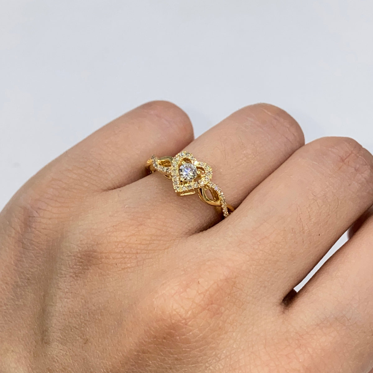 14K Gold Infinity Heart Diamond Engagement Ring in yellow gold - close-up product photo