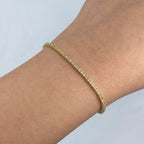 14K Gold 2mm Diamond Tennis Bracelet 6.5–7 in in yellow gold, 6.5" - close-up product photo