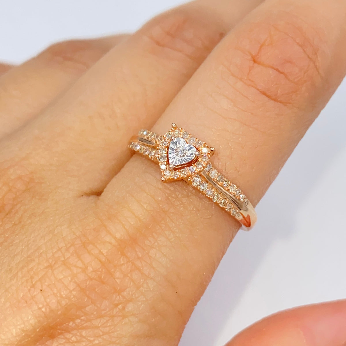 10K Gold Heart Halo Diamond Ring in rose gold - close-up product photo