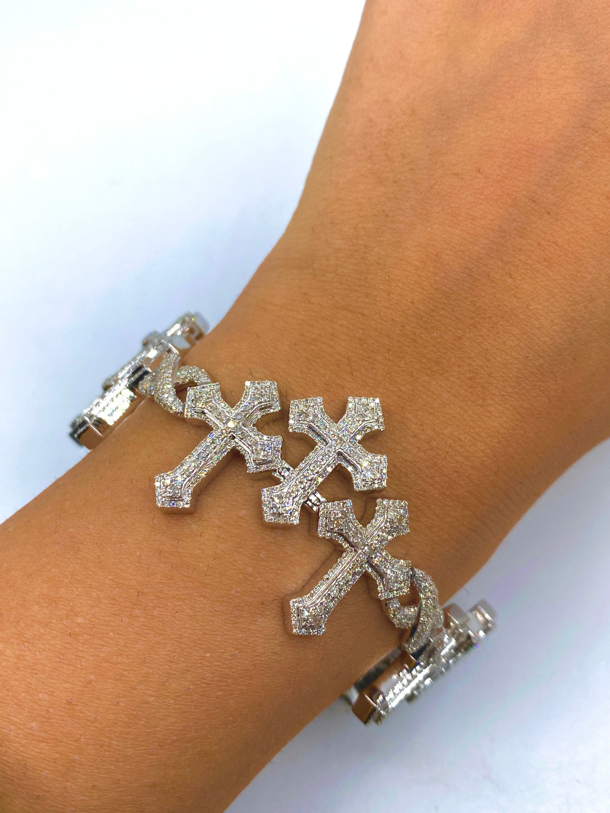 10K Gold Triple Infinity Cross Diamond Bracelet in white gold - close-up product photo