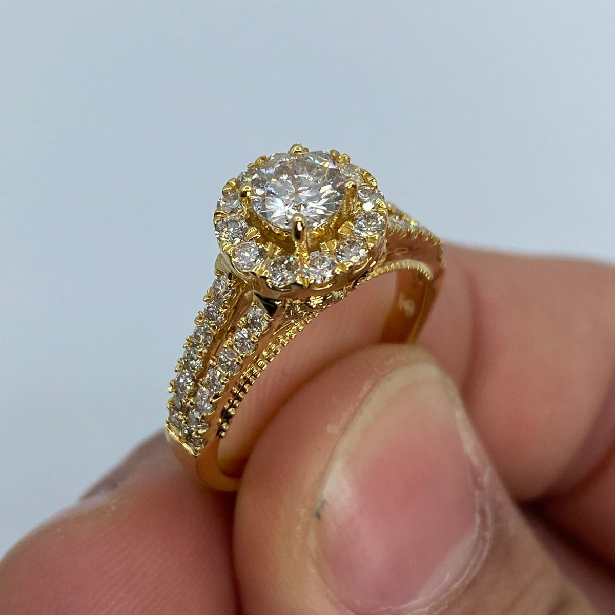 14K Gold Jumbo Center Diamond Halo Engagement Ring in yellow gold - close-up product photo