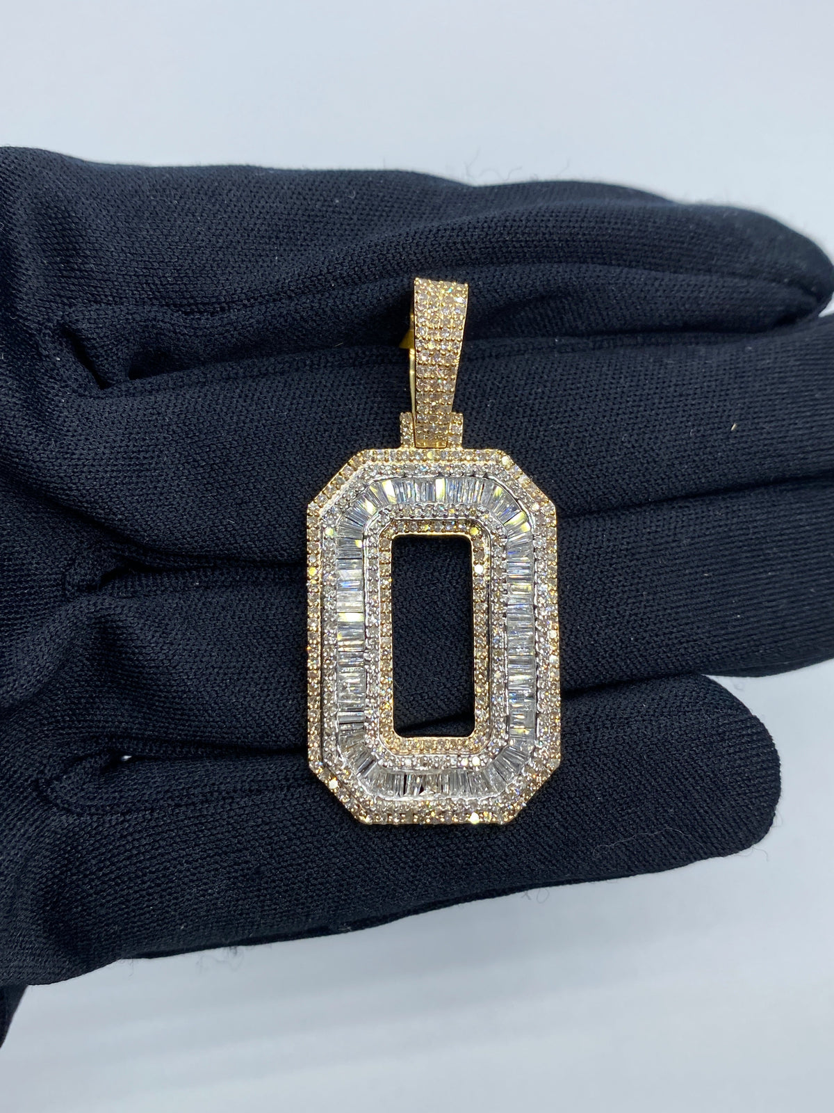 Initial O Baguette Diamond Pendant in yellow - close-up product photo