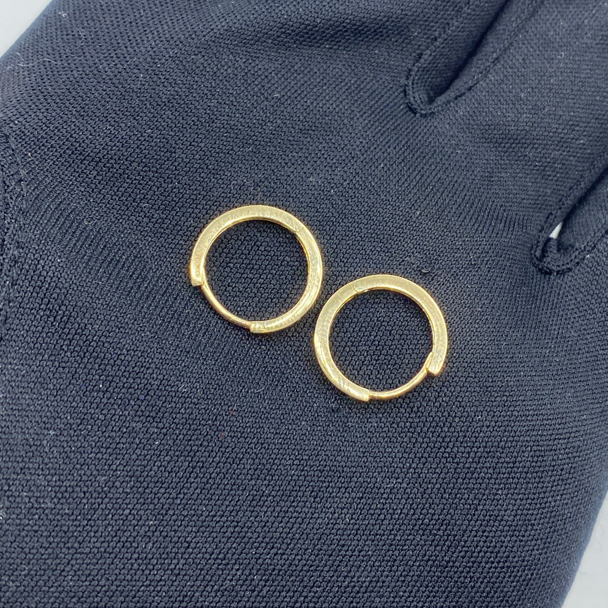 14K Gold Hoop Earrings in yellow gold - close-up product photo