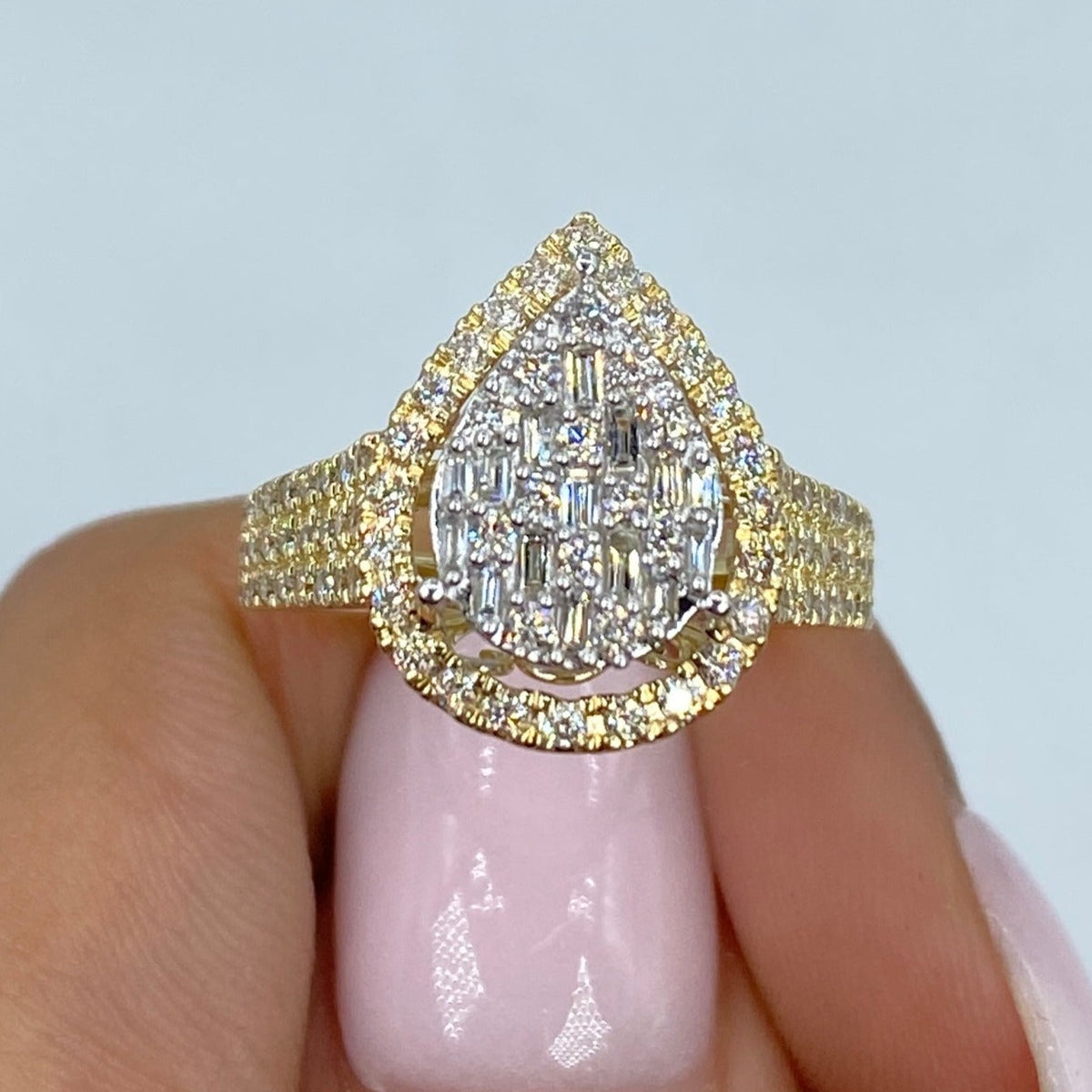 14K Gold Pear Halo Diamond Baguette Ring in yellow gold - close-up product photo