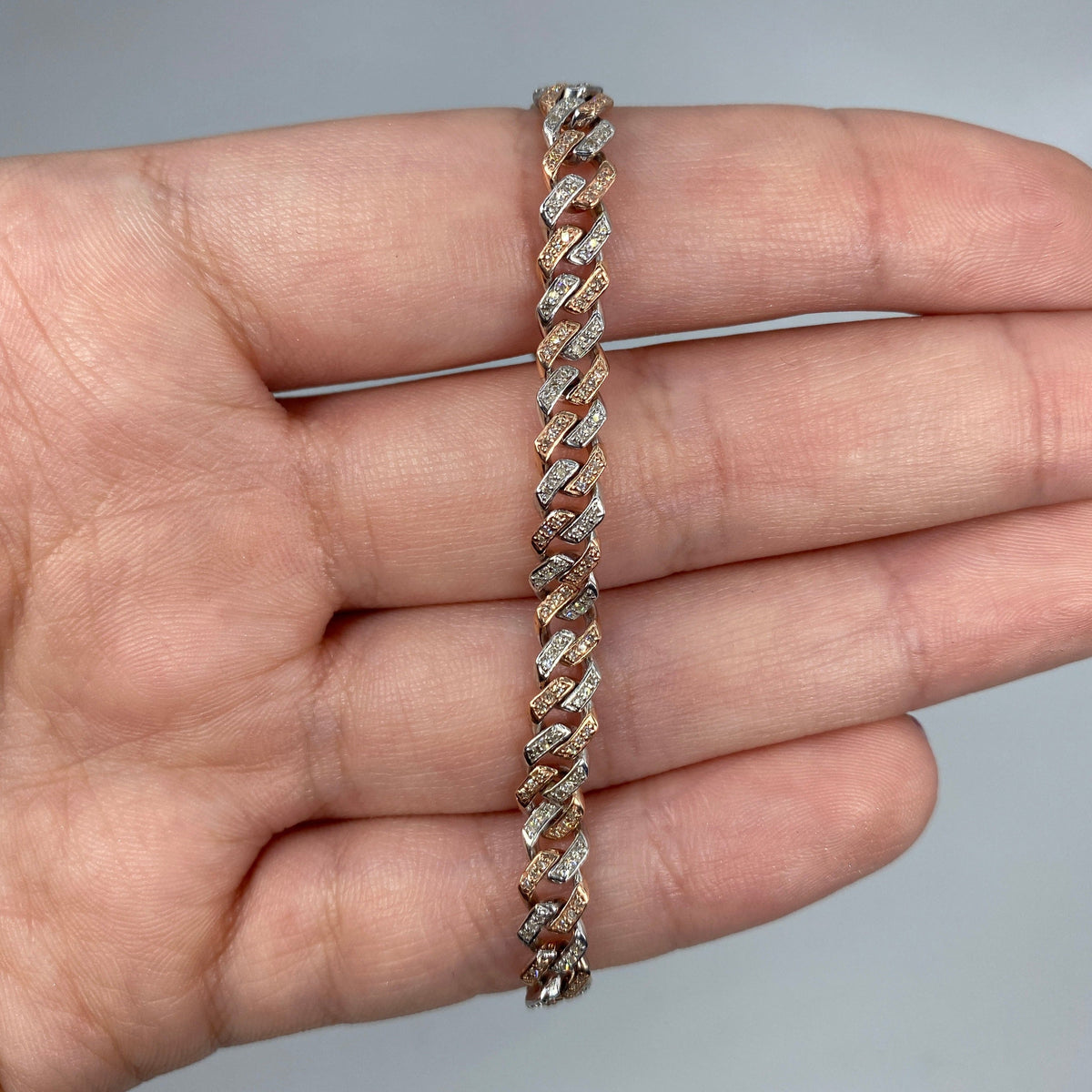 10K Gold 5.5mm Cuban Link Diamond Bracelet 7–8 in in two-tone (white & rose), 7" - close-up product photo