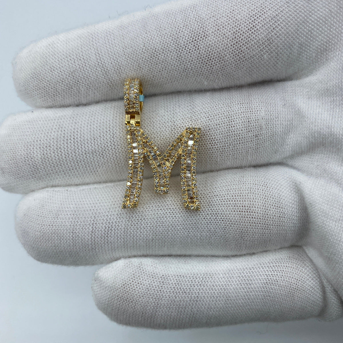 14K Gold Initial M Diamond Baguette Pendant in yellow gold, Small - close-up product photo