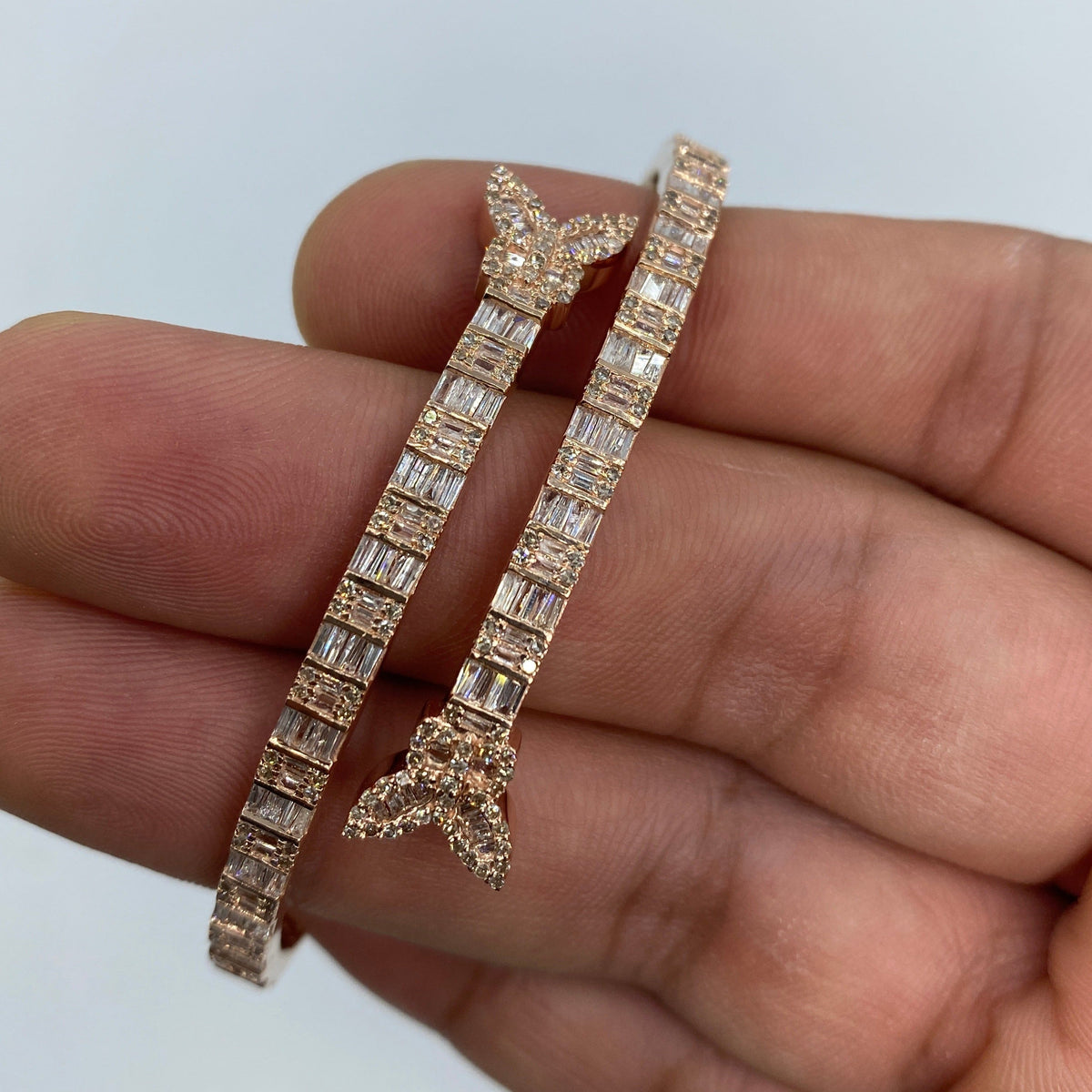 10K Gold Bangle Butterfly Diamond Baguette Bracelet in rose gold - close-up product photo