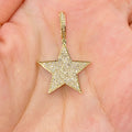 14K Gold World Star Diamond Pendant in yellow gold - close-up product photo