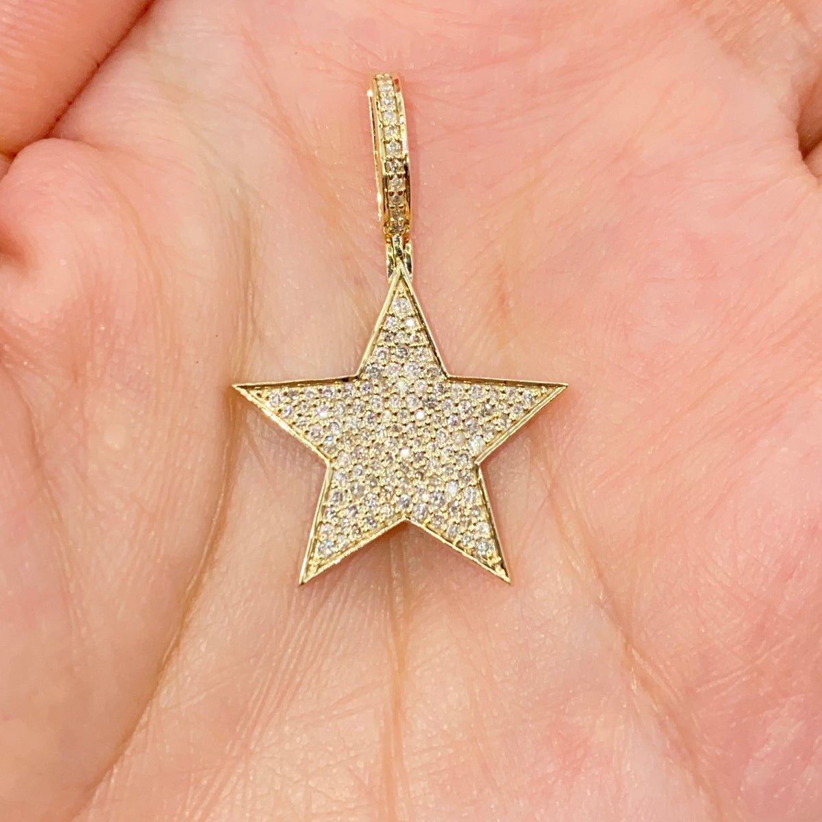 14K Gold World Star Diamond Pendant in yellow gold - close-up product photo
