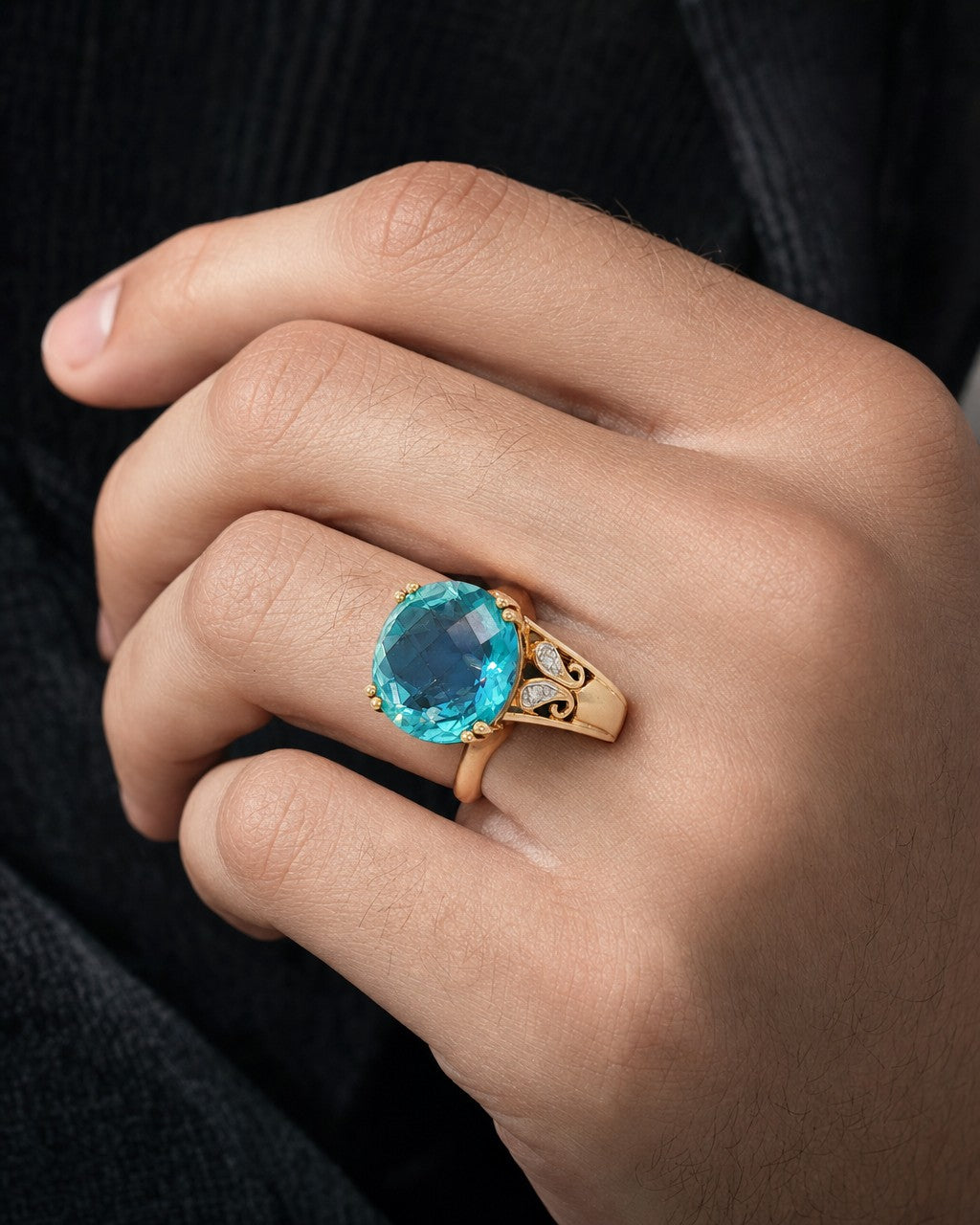 Male model wearing 10k Yellow Gold Cocktail Ring with Oval Aquamarine Cabochon