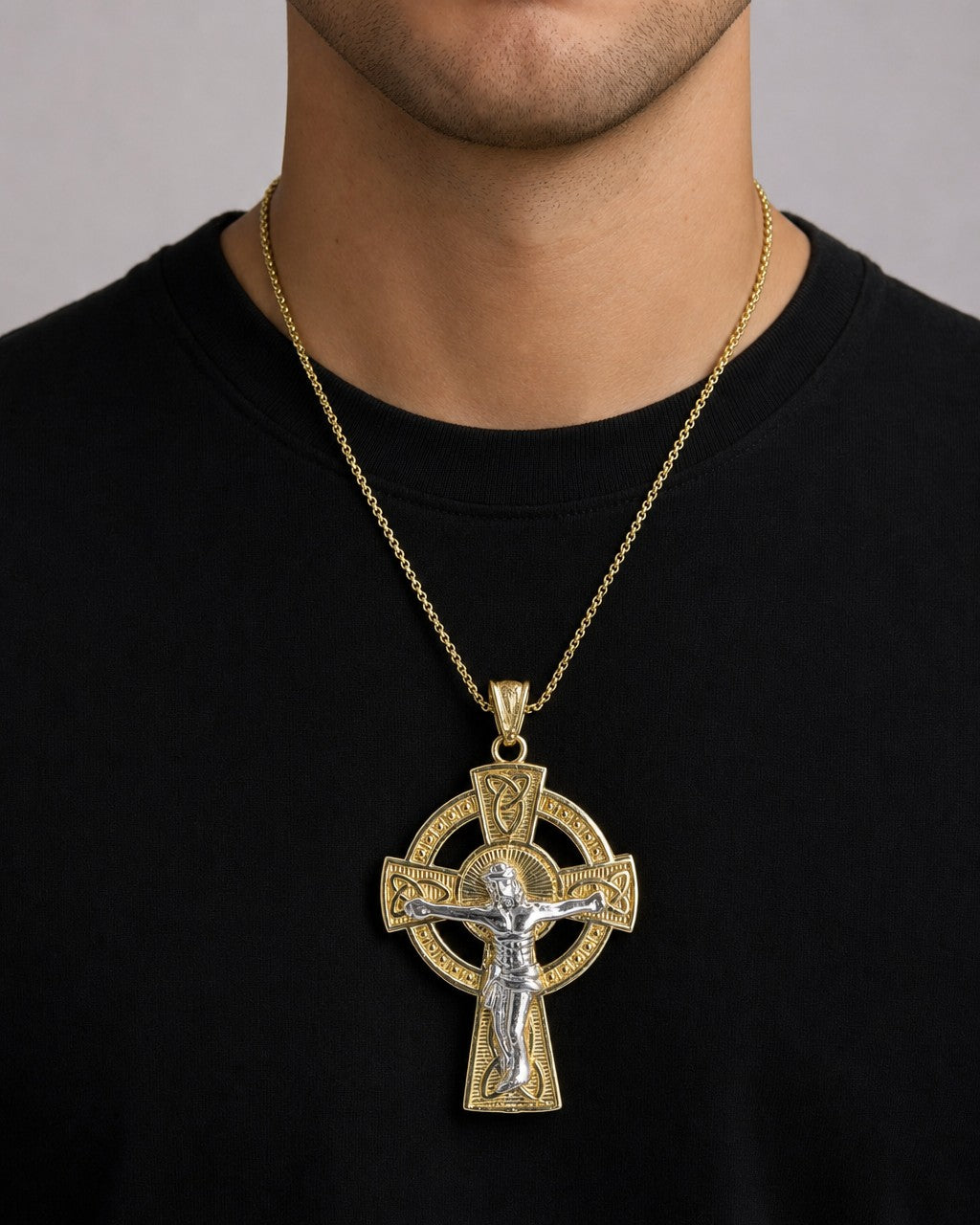 Male model wearing 14K Gold Cross Pendant with Jesus