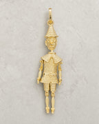 14K Gold Pinocchio Pendant styled photo