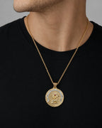 Male model wearing 14k Gold Caridad Del Cobre Pendant
