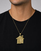 Male model wearing 10K Gold House Pendant