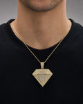 Male model wearing 10K Gold and White Saphire Diamond Shape Pendant